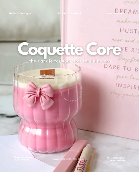Decorative Ripple Glass cup with pink bow on it filled with a pink candle with wood wick.